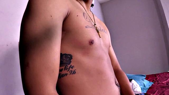 Latino Boy Roko Strips Naked and Strokes his Hard Cock on the Bed