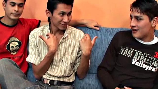 These three Latin twinks are on the sofa, planning their bareback threesome. Alfredo is the first to get naked and feeds Eduardo his big stiff cock, while Ferdynan goes down on Eduardo.