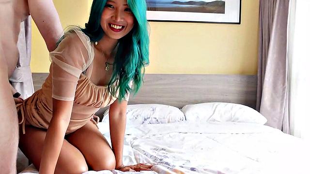 Green Haired Thai Girl Plays with Cum