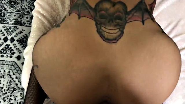 Deepthroating tattooed amateur MILF in fishnets POV fucked