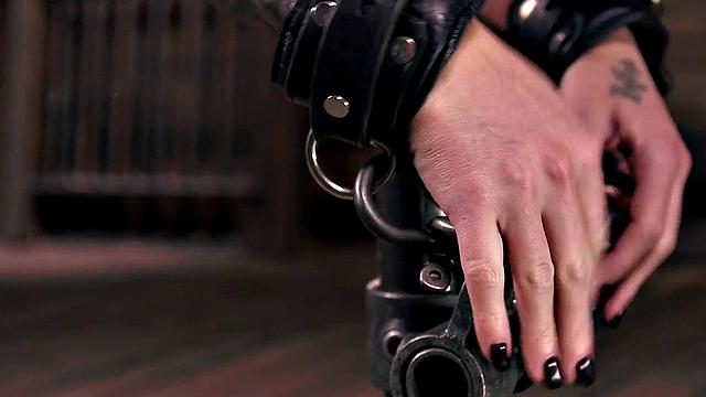 Mouthgagged submissive handling pole fuck