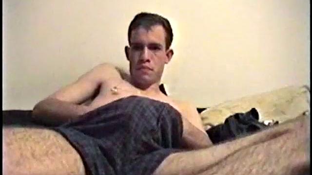 Putting his hairy ass and balls in our face, Nate gets himself hard, with a little help from some porn magazines. The young man kneels over his porn, and a box, with a pillow tucked between his legs.