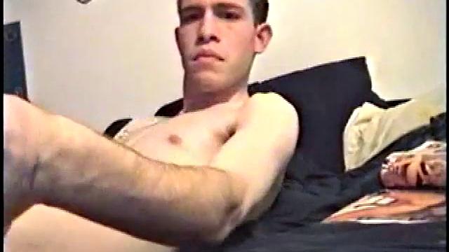 Putting his hairy ass and balls in our face, Nate gets himself hard, with a little help from some porn magazines. The young man kneels over his porn, and a box, with a pillow tucked between his legs.