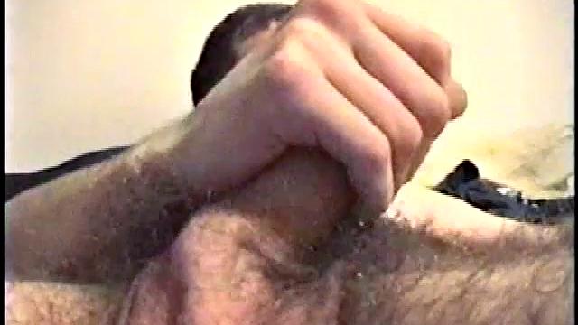 Putting his hairy ass and balls in our face, Nate gets himself hard, with a little help from some porn magazines. The young man kneels over his porn, and a box, with a pillow tucked between his legs.