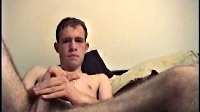 Putting his hairy ass and balls in our face, Nate gets himself hard, with a little help from some porn magazines. The young man kneels over his porn, and a box, with a pillow tucked between his legs.