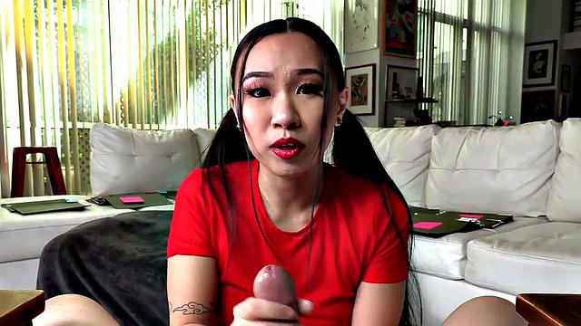 Teasing Asian domina wanks cock in POV handjob