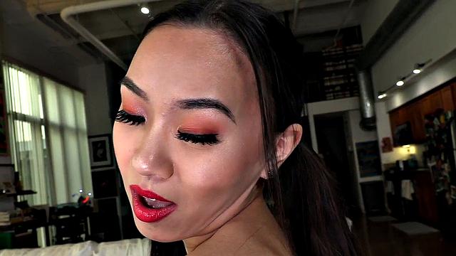 Teasing Asian domina wanks cock in POV handjob