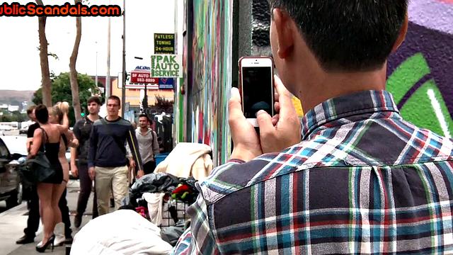 BDSM public slut with small boobs whipped outdoors on street