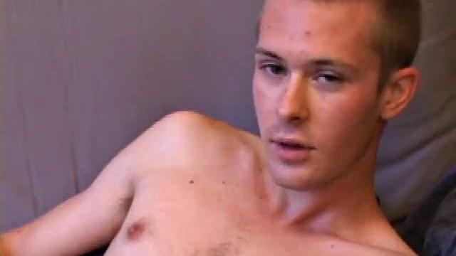 Tommy Nolan quickly strips naked and begins pulling on his dick, while watching a porn video. He works up a nice stiff one and then shows us his pretty ass. Then he gets down to business, stroking his hard cock.