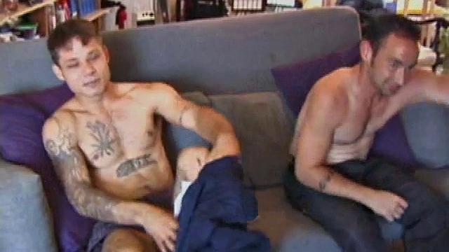 Dillon and Joe are sitting on the couch talking about how they have never done anything with another guy before. Well that's about to change. They both have their dicks out at once and Dillon is soon on his knees with Joe's in his mouth.