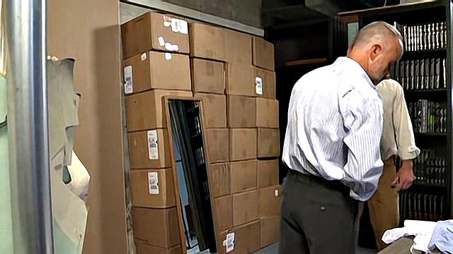 Coworkers Examining the Goods - Brett Cox, Gianni Purelli, & Mike Tanner