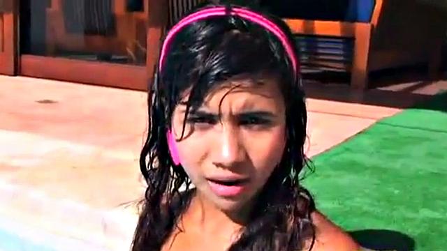 Watch as Latina teen Tobie Teen fingers herself at the pool in hot solo action