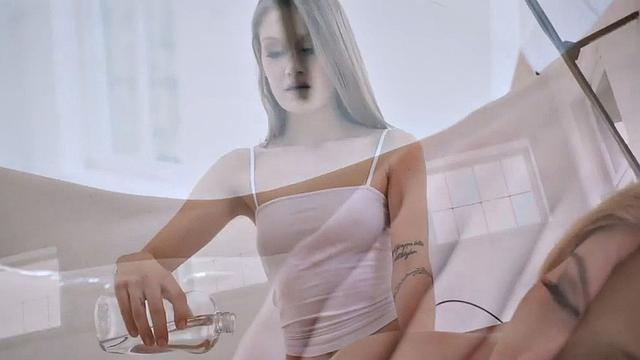 Oiled Lesbo pussyfucked with dildo