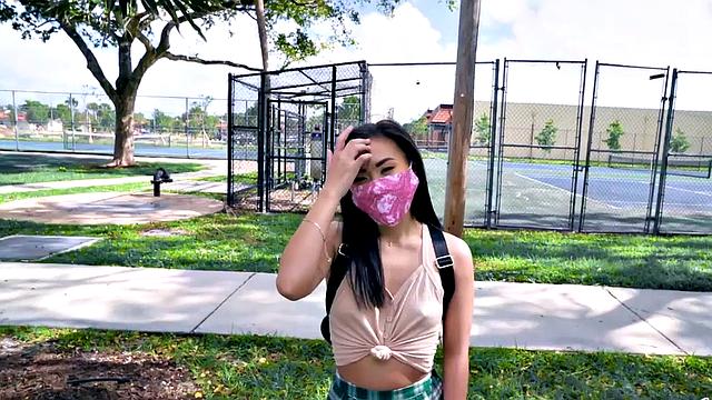 Asian teen with small tits takes a hard pounding in the car in POV