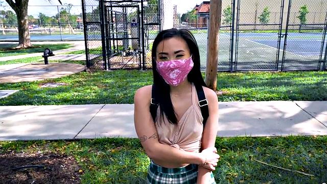 Asian teen with small tits takes a hard pounding in the car in POV