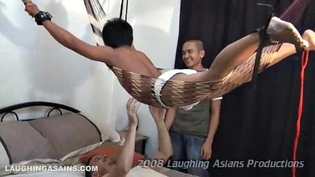 We put Benjie in a net hammock and suspended him nice and high above the bed for full access to every inch of his smooth ticklish body. Benjie's ticklishness really came out at maximum level in this incredibly hot tickle fetish video.