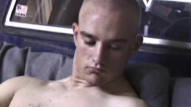 If you like your guys lookin gpretty butch, with lean and lightly muscled bodies, pierced nips, shaved head, Kenny for you. We join him in the back of his pickup truck, parked in a garage.