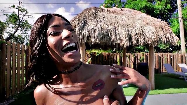 A black babe get her wet pussy pounded by a BBC in hot outdoor pool action