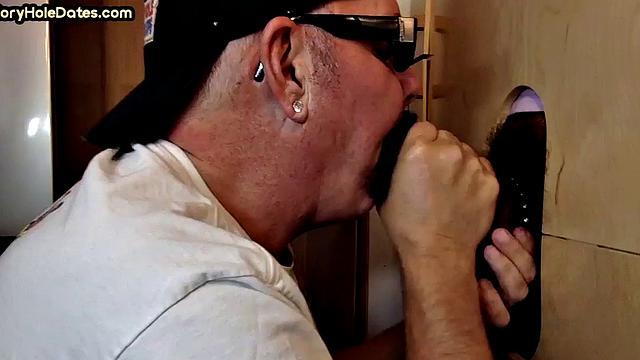 BJ gloryhole DILF eats Black cock in closeup