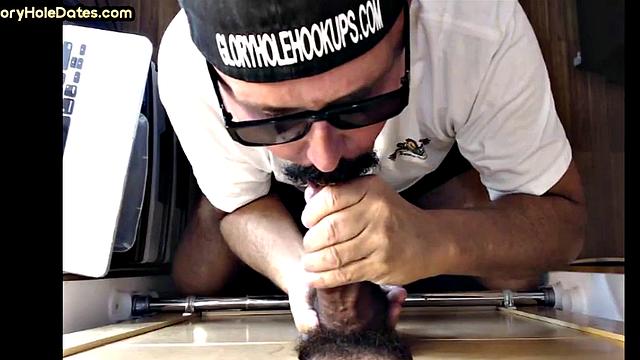 BJ gloryhole DILF eats Black cock in closeup