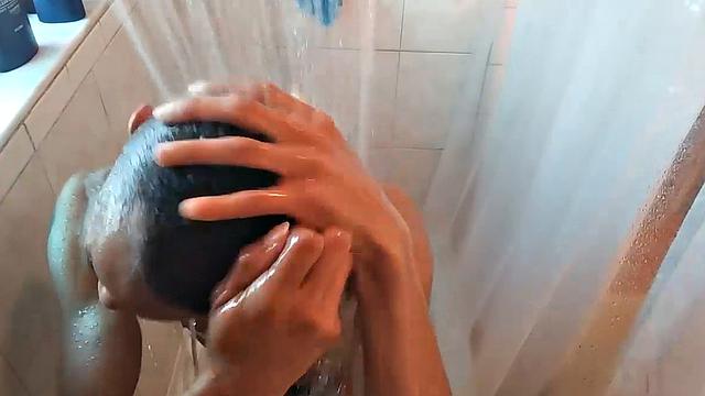 Naked in the shower, Calvin Collins soaps down his smooth ebony body, before giving his big cock some attention. We enjoy a good look at his little butt, before Calvin gets busy jerking himself off.