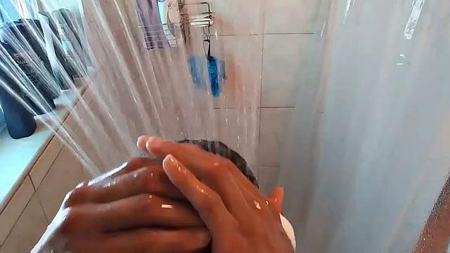 Naked in the shower, Calvin Collins soaps down his smooth ebony body, before giving his big cock some attention. We enjoy a good look at his little butt, before Calvin gets busy jerking himself off.