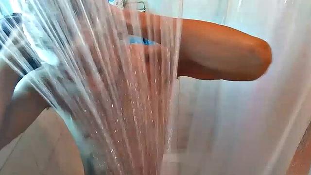 Naked in the shower, Calvin Collins soaps down his smooth ebony body, before giving his big cock some attention. We enjoy a good look at his little butt, before Calvin gets busy jerking himself off.