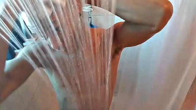 Naked in the shower, Calvin Collins soaps down his smooth ebony body, before giving his big cock some attention. We enjoy a good look at his little butt, before Calvin gets busy jerking himself off.