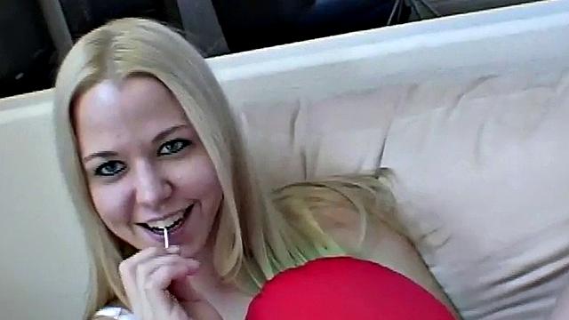 Hot blonde sucking lolly in softcore scene