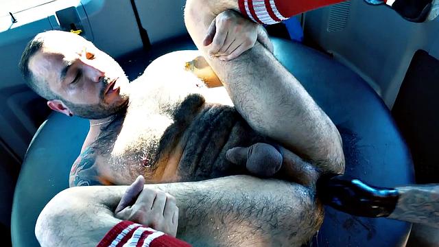 Hairy bottom fisted and fucked by tattooed daddy in van