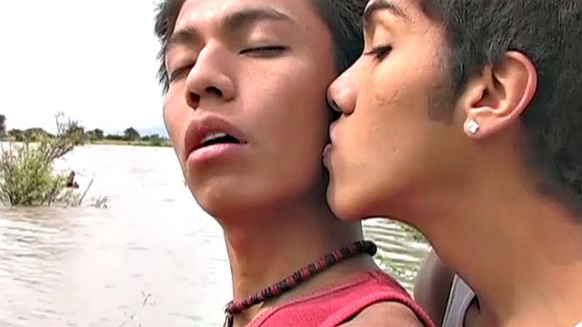 Latin twinks Jonathan and Andres are on the banks of a river for an afternoon of fishing. At some point, lust takes over and the two start kissing. Soon both have big boners popping out of their shorts and it isn't long before they are naked.