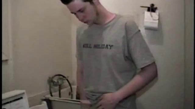 Boy-next-door spreads his new straight porn magazine on top of the washing machine and pulls his cock out of the fly.