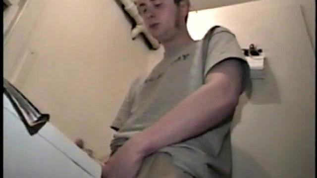 Boy-next-door spreads his new straight porn magazine on top of the washing machine and pulls his cock out of the fly.