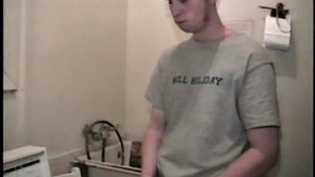 Boy-next-door spreads his new straight porn magazine on top of the washing machine and pulls his cock out of the fly.