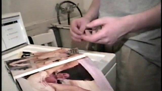 Boy-next-door spreads his new straight porn magazine on top of the washing machine and pulls his cock out of the fly.