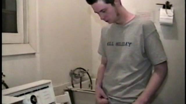 Boy-next-door spreads his new straight porn magazine on top of the washing machine and pulls his cock out of the fly.