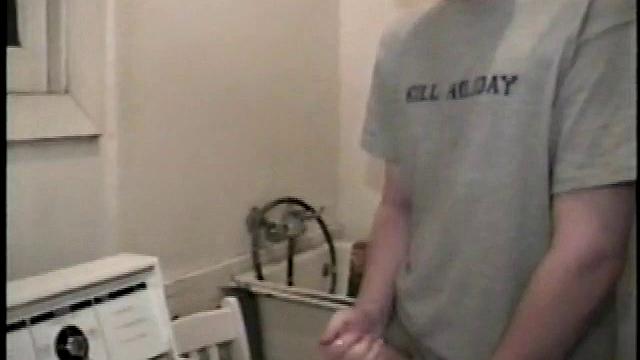 Boy-next-door spreads his new straight porn magazine on top of the washing machine and pulls his cock out of the fly.