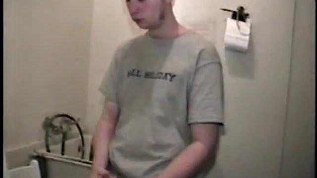 Boy-next-door spreads his new straight porn magazine on top of the washing machine and pulls his cock out of the fly.