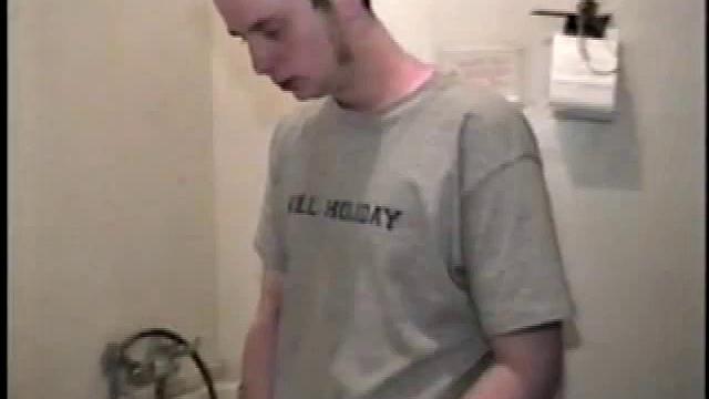 Boy-next-door spreads his new straight porn magazine on top of the washing machine and pulls his cock out of the fly.