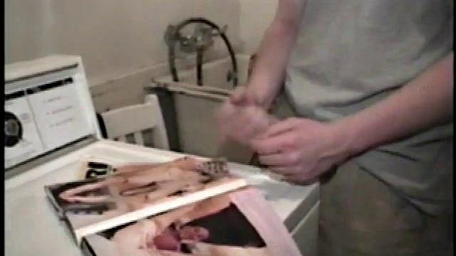 Boy-next-door spreads his new straight porn magazine on top of the washing machine and pulls his cock out of the fly.