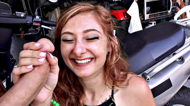 Scooter Trouble gives you the best outdoor handjob ever with her tattooed pussy