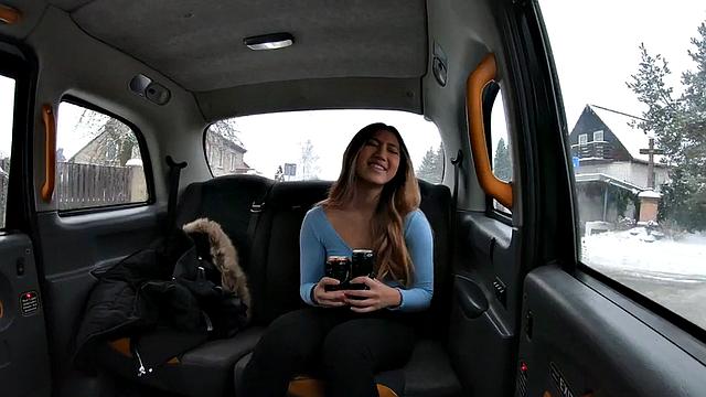 Naughty Asian cabby bangs her tight snatch in reverse cowgirl position