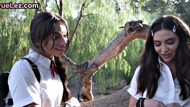 Scissoring lesbians rubbing pussies before fingering