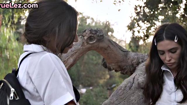 Scissoring lesbians rubbing pussies before fingering