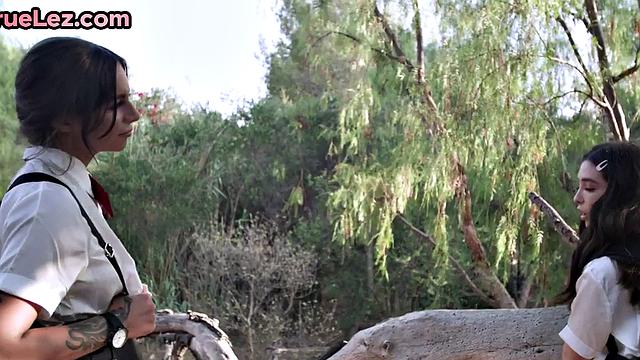 Scissoring lesbians rubbing pussies before fingering