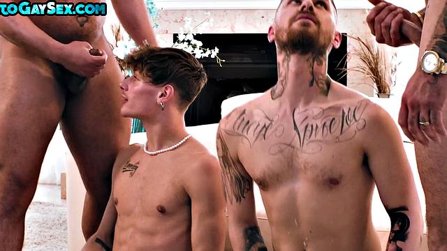 Tattooed anal stud and twink barebacked in orgy for facial