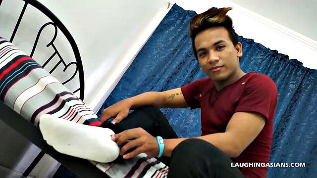 This super cute Asian man has perfect Asian male feet. You're going to love this masculine hunk as he slowly peels off his shoes and socks up close for you.