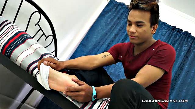 This super cute Asian man has perfect Asian male feet. You're going to love this masculine hunk as he slowly peels off his shoes and socks up close for you.