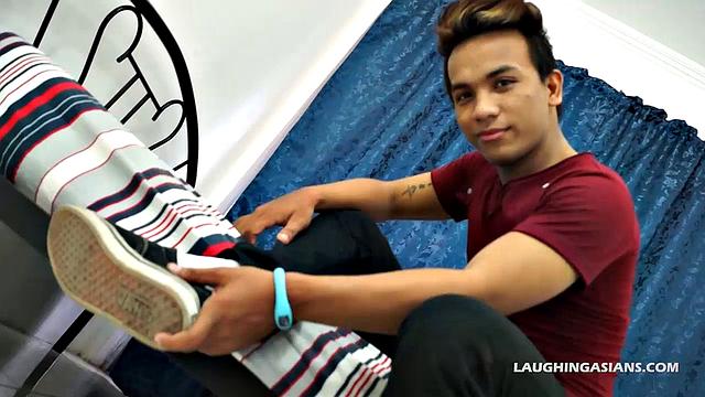 This super cute Asian man has perfect Asian male feet. You're going to love this masculine hunk as he slowly peels off his shoes and socks up close for you.