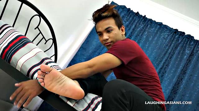 This super cute Asian man has perfect Asian male feet. You're going to love this masculine hunk as he slowly peels off his shoes and socks up close for you.